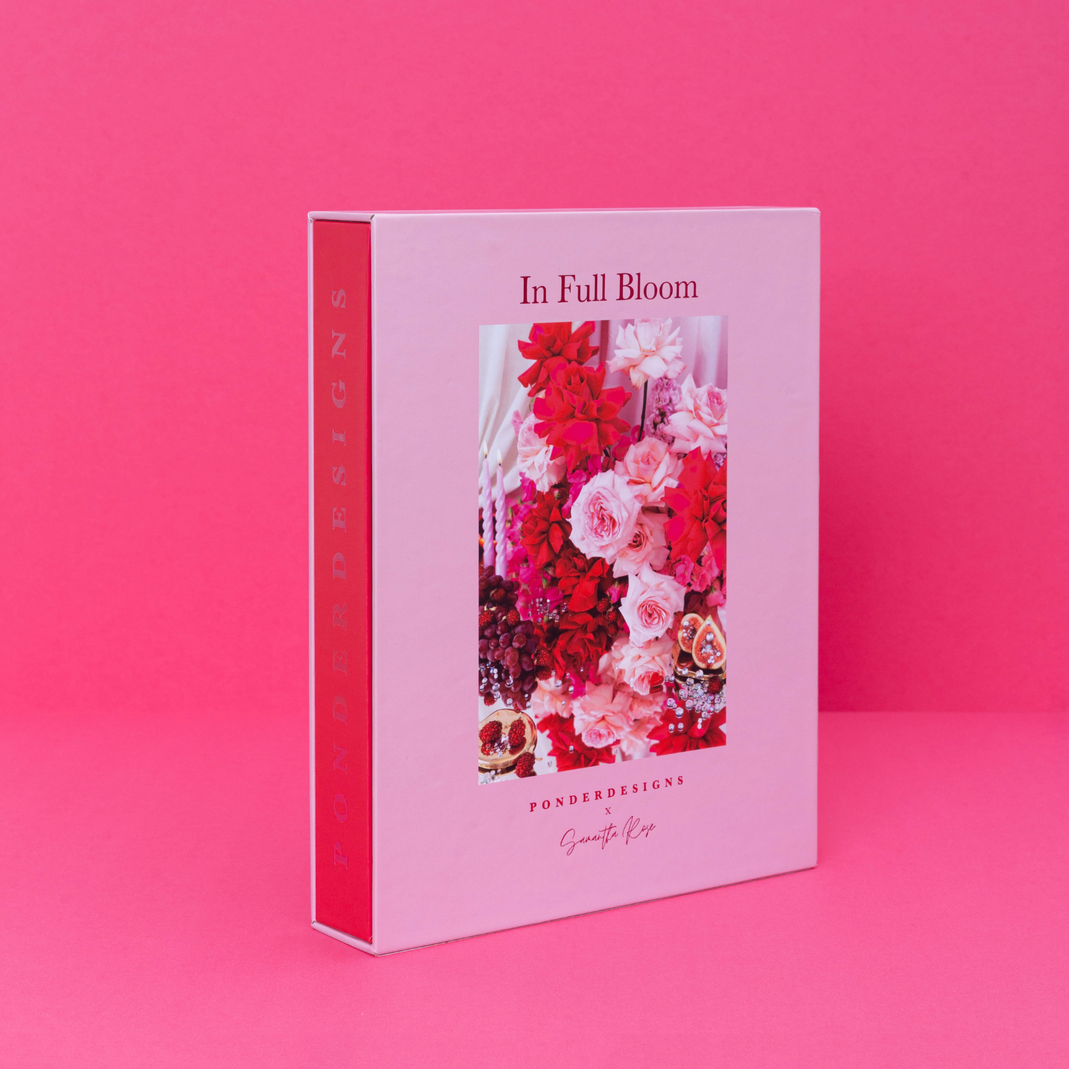 Ponder Design Co's In Full Bloom 1,000 piece jigsaw puzzle designed in collaboration with Samantha Rose. Hero puzzle packaging with florals, figs and pinks. Ponder while you puzzle.