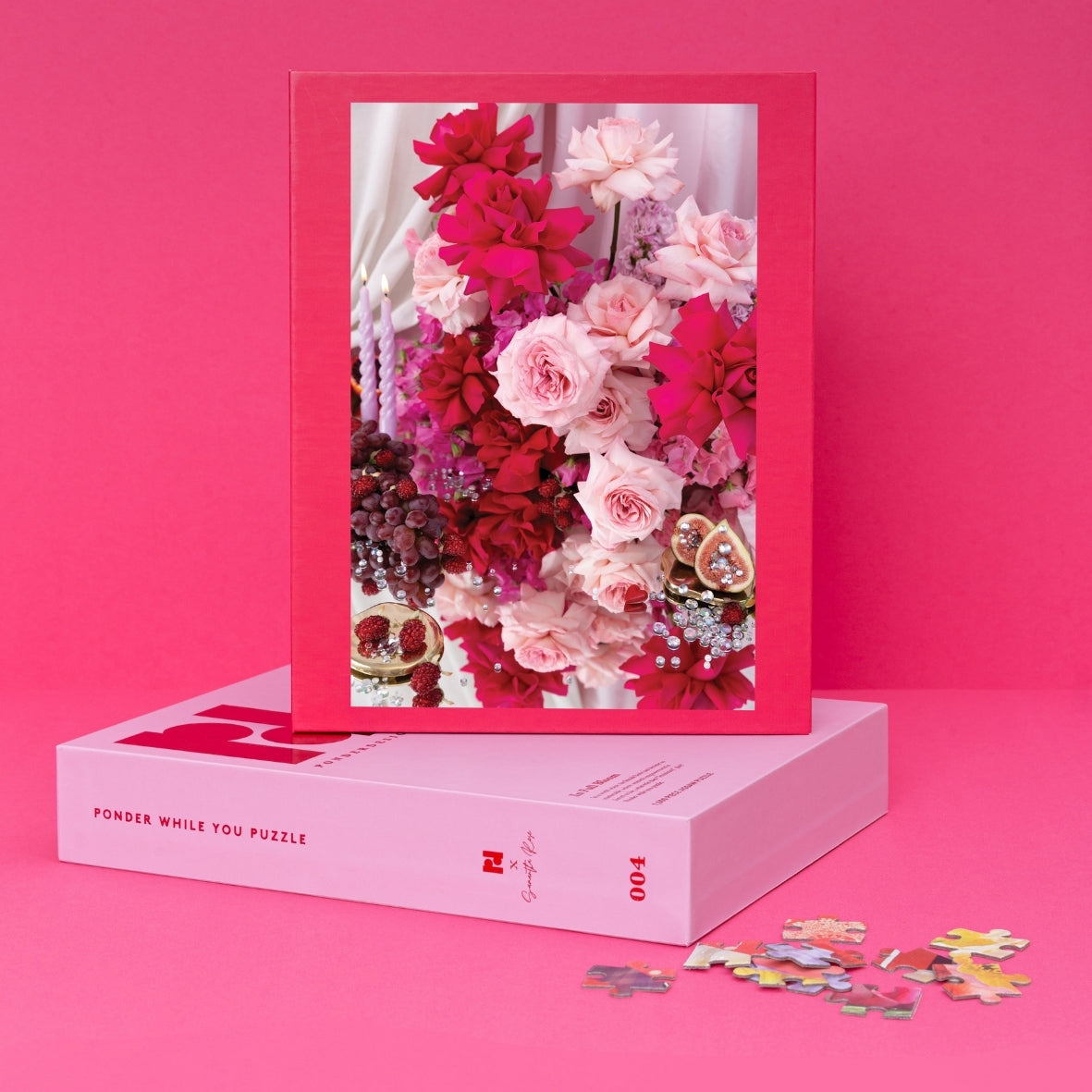 Ponder Design Co's In Full Bloom 1,000 piece jigsaw puzzle designed in collaboration with Samantha Rose. Hero puzzle packaging with florals, figs and pinks. Ponder while you puzzle.